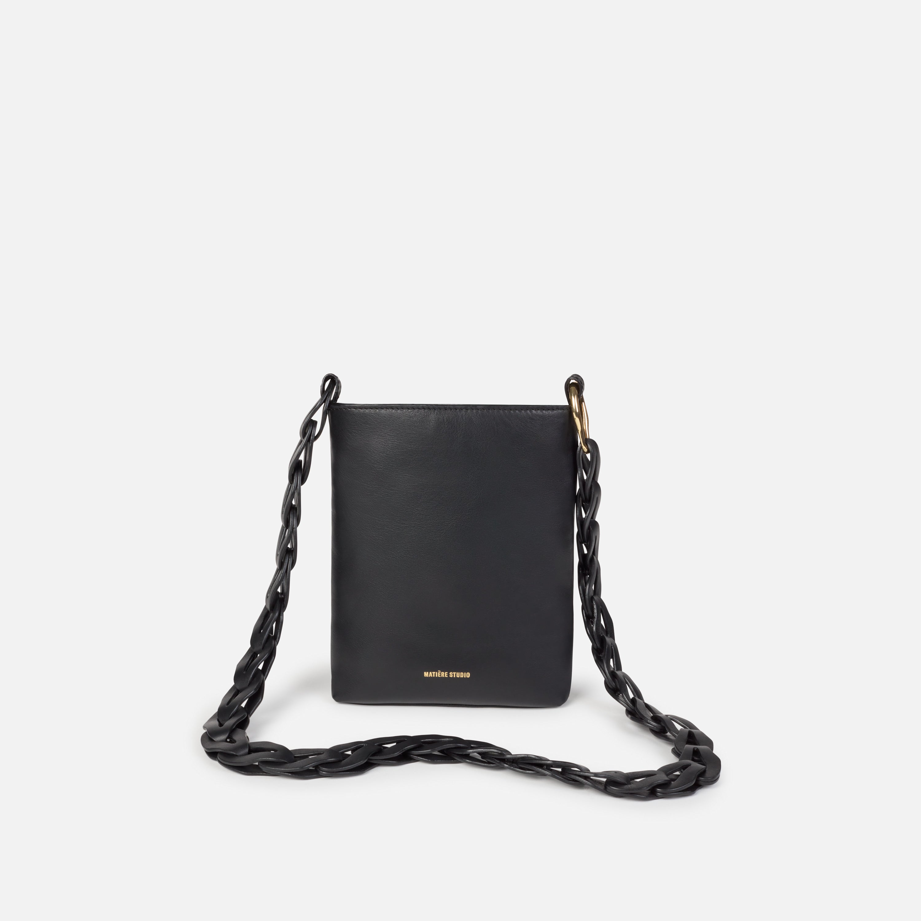 Truffle Collection structured bucket bag with cross body strap in black